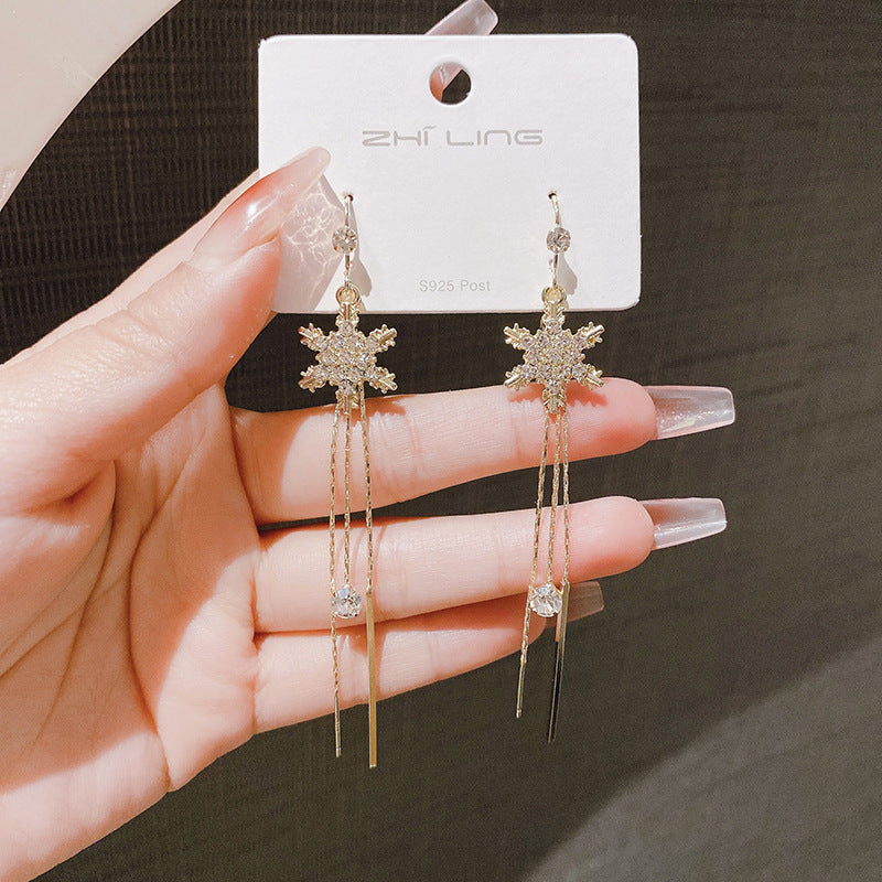 Gold Snowflake Tassel Earrings