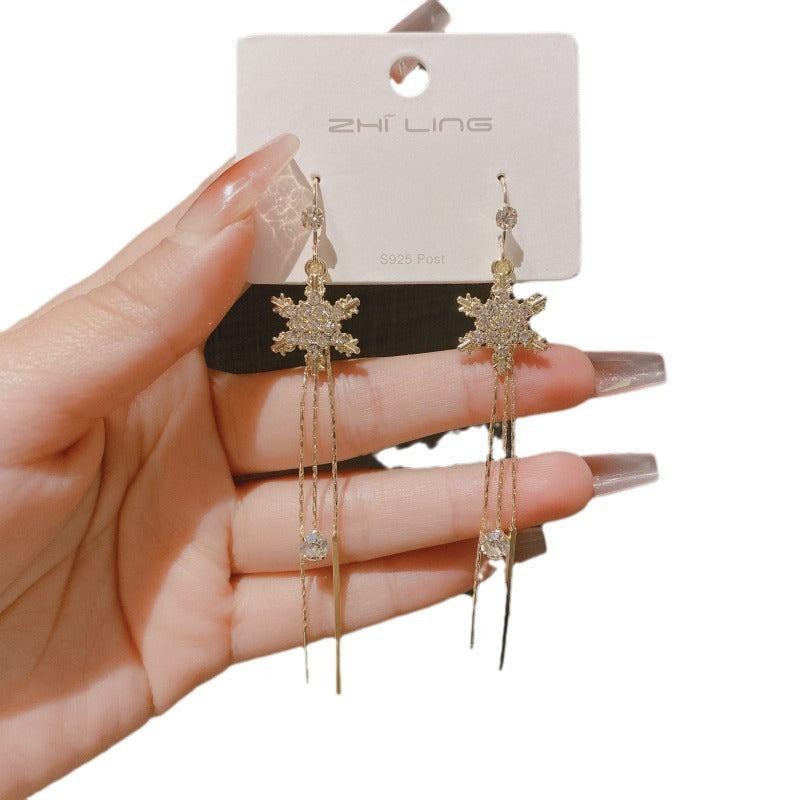 Gold Snowflake Tassel Earrings