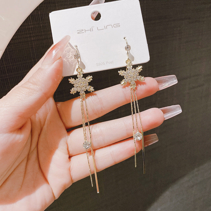 Gold Snowflake Tassel Earrings